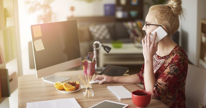 A woman discussing business debt settlement